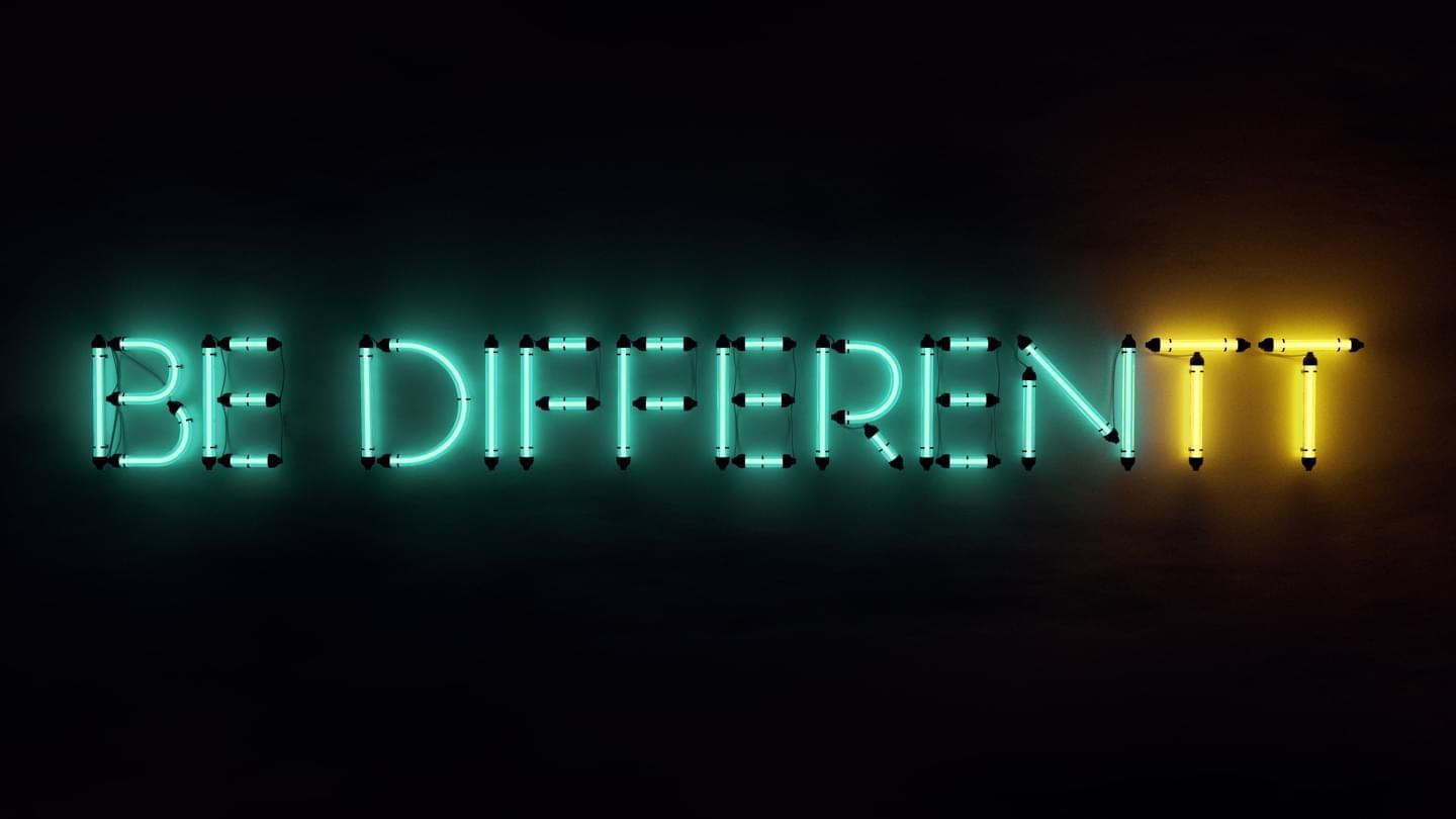 The rendering shows the slogan 'Be Different' - written in neon light letters.